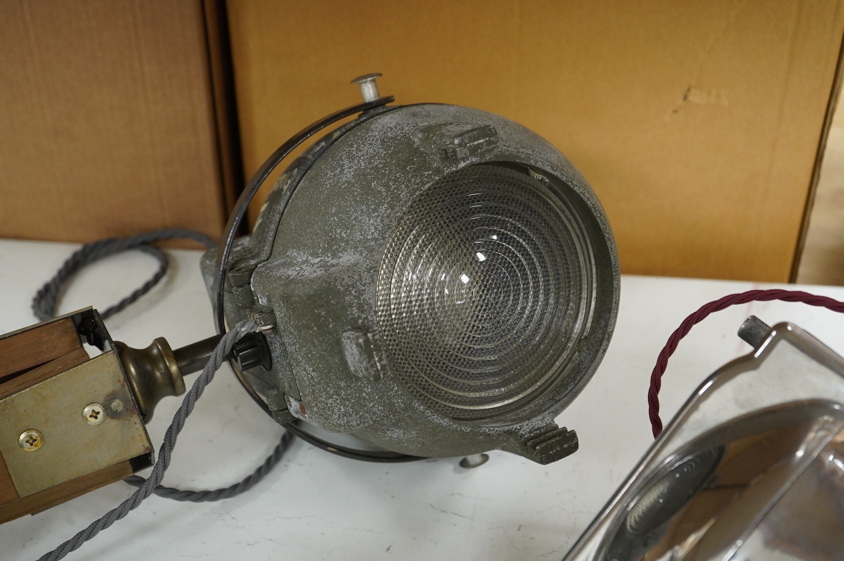 A vintage strand electric theatre lamp on tripod base, 89cm high